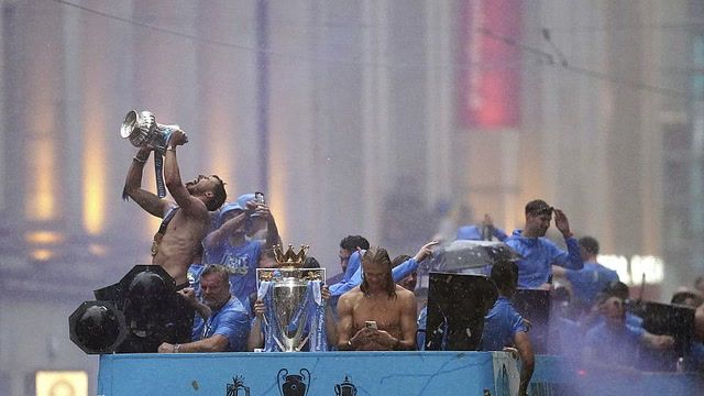 Manchester City celebrate treble glory with fans