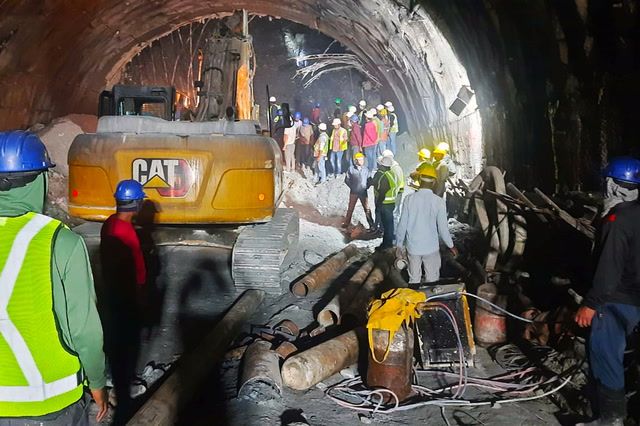 Indian rescuers battle to save trapped tunnel workers