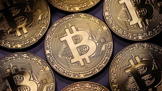Bitcoin surges to $62,000, nearing all-time high