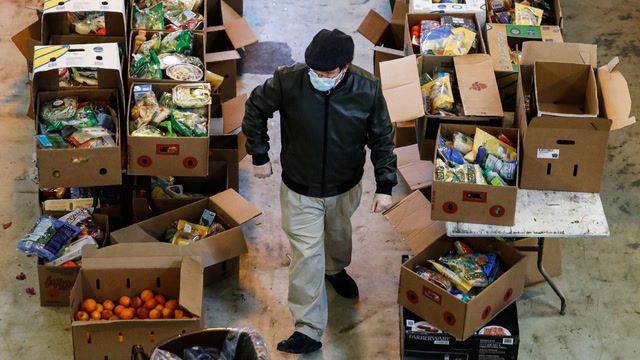 Struggling migrants turn to food aid in U.S.