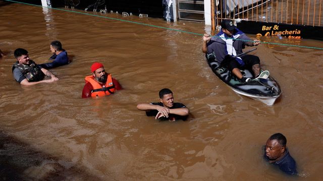 Rescuers race to reach survivors after floods in southern Brazil