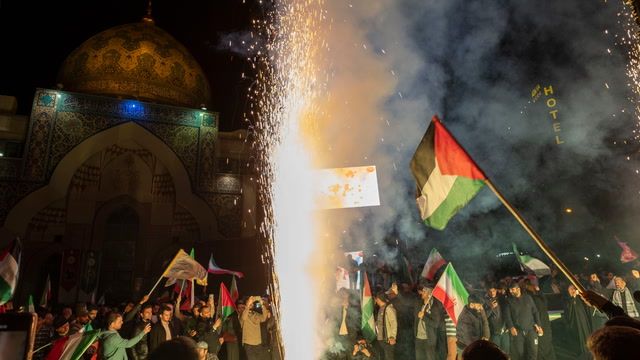 Iranians celebrate in the streets after Israel attack