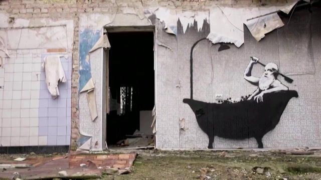 Ukrainian locals meet reclusive Banksy