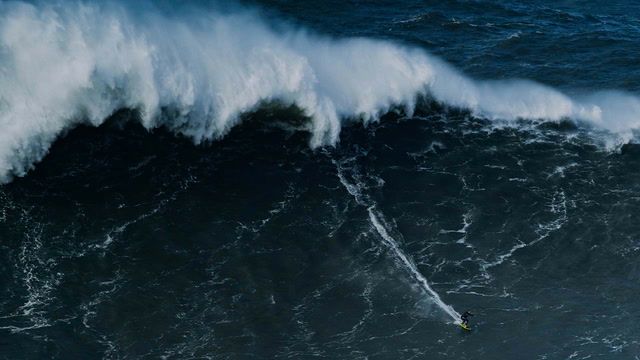 Claims world record broken for biggest wave surfed