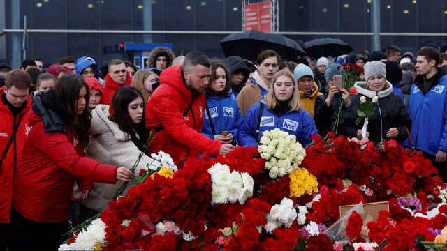Russia mourns victims as concert hall attack suspects appear in court