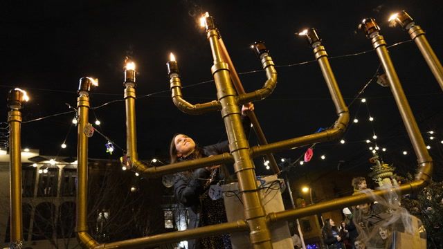 Hanukkah celebrations subdued amid Israel-Hamas conflict