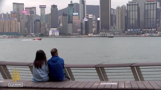 Hong Kong tries to tempt tourists back with free flights