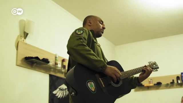 Musicians in uniform boost morale of Ukrainian troops